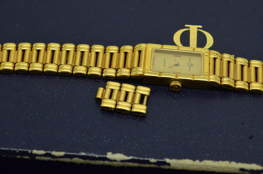 14K Yellow Gold Baume & Mercier ladies wristwatch - extra links & orig packaging