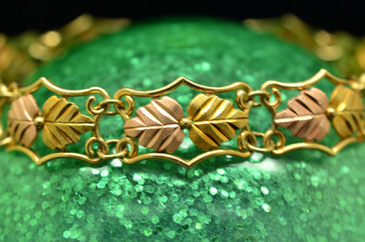 7" 10K Yellow Gold Black Hills Gold leaves chain bracelet 11mm 8.4 grams