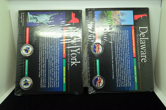 Four colorized state quarters in sealed display panels New York & Delaware