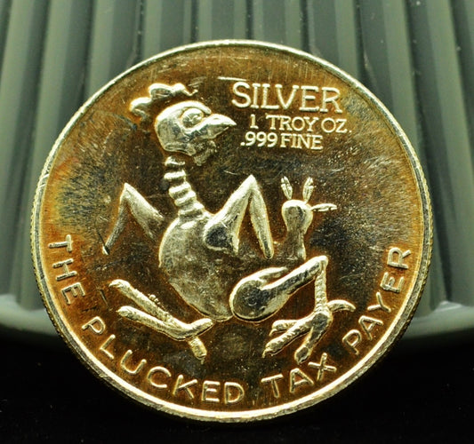 The Plucked Taxpayer Int'l World Trade  Art Round -1 Troy Oz .999 Silver