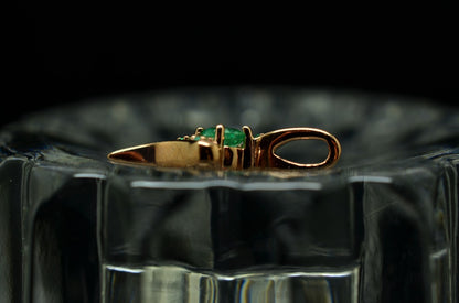 10K Rose Gold floating bypass design pendant charm with green emeralds