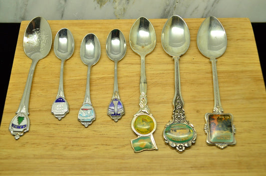 LOT OF 7 SILVER PLATED ENAMEL COLLECTOR SPOONS -VARIOUS FROM AROUND THE USA