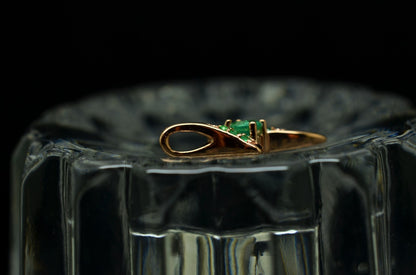 10K Rose Gold floating bypass design pendant charm with green emeralds