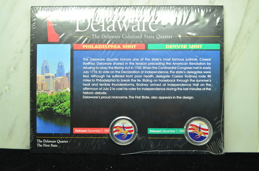 Four colorized state quarters in sealed display panels New York & Delaware