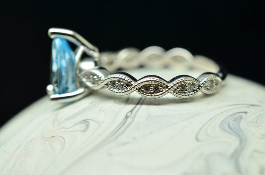 14K White Gold Pear Cut Blue Topaz Engagement Ring with Diamond accents Size 7
