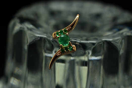 10K Rose Gold floating bypass design pendant charm with green emeralds