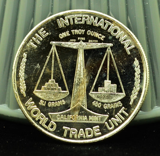 The Plucked Taxpayer Int'l World Trade  Art Round -1 Troy Oz .999 Silver