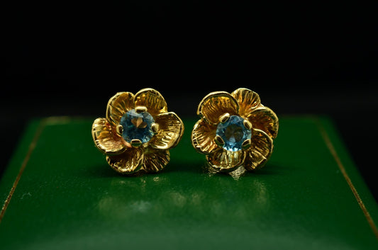 14K Yellow Gold Flower Setting Blue Topaz Stud Earrings