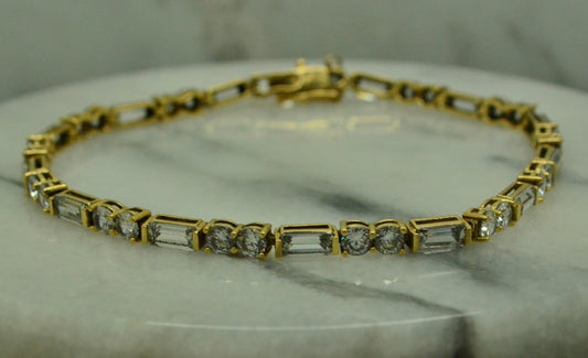 7" 14K Yellow Gold round & baguette cut cubic zirconia tennis bracelet 3mm 7.3g