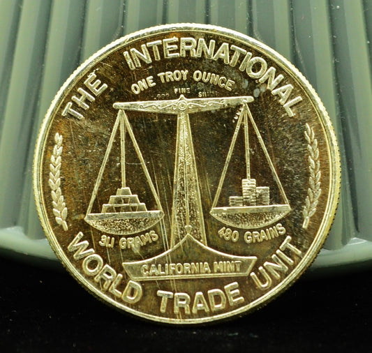 The Plucked Taxpayer Int'l World Trade  Art Round -1 Troy Oz .999 Silver