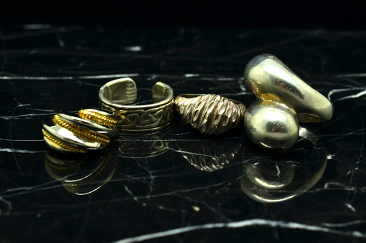 Lot Of Four 925 Sterling Silver ring bands -various designs & sizes