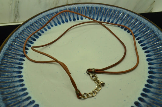 17.5" 925 Sterling Silver clasp on two-strand leather thong