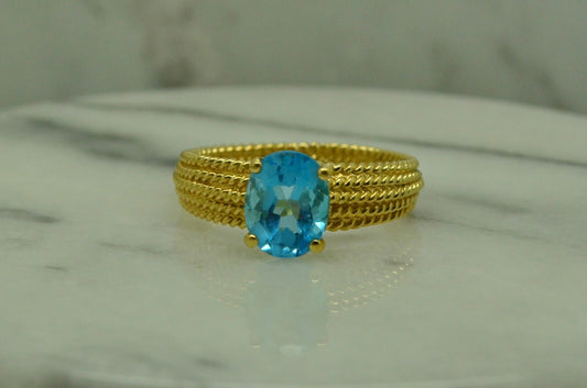 14K Yellow Gold oval blue topaz solitaire ring size 9